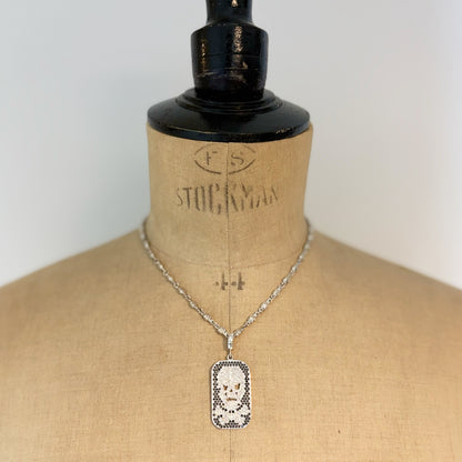 LOREE RODKIN SKULL CROSS BONE TAG