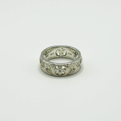 SMALL FLAT ENGRAVED BAND W/PRINCESS ROUND
